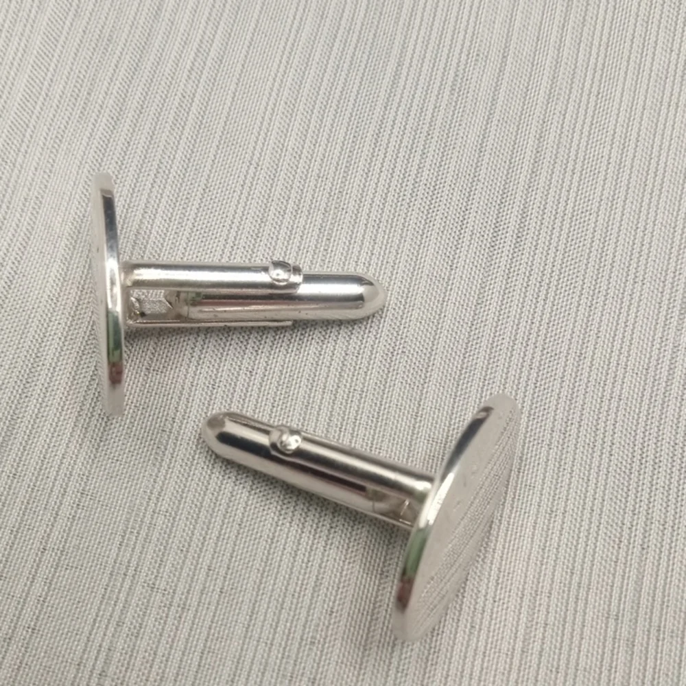 Silver Toned Oval Cufflinks By Swank